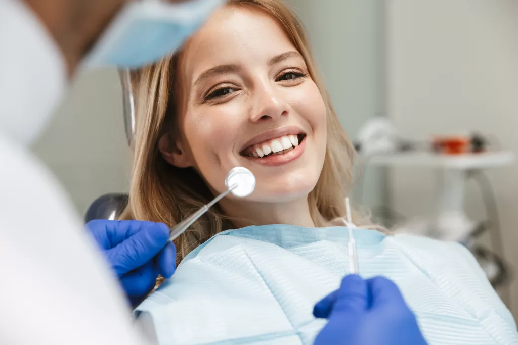 Dental patient getting ready for teeth to be examined
